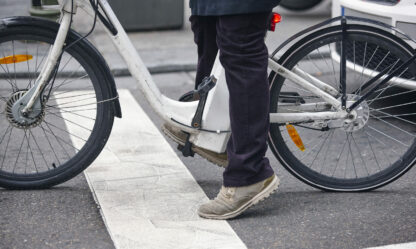 Electrical bike detail in the city. Urban lifestyle. No pollution