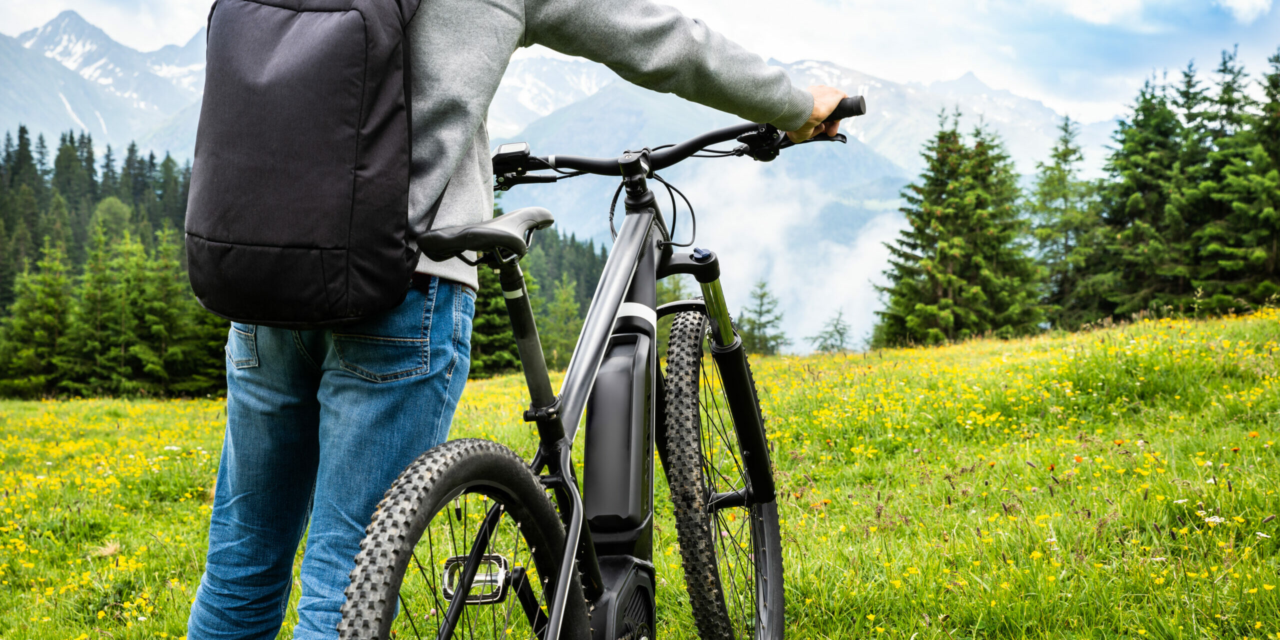 Main On Mountain With His Bike