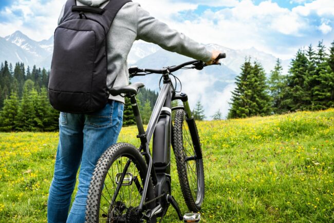 Main On Mountain With His Bike